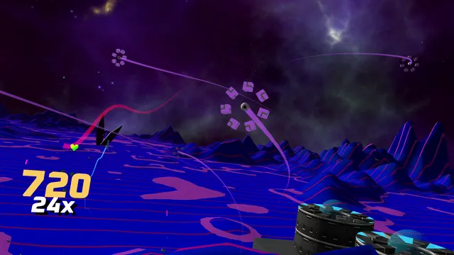 Blue dunes veined with magenta. A cluster of cubes comes apart in mid-air, the score reading 720 at a 24x multiplier.